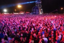 A TweetWall  entertains the crowd waiting for the concert to begin